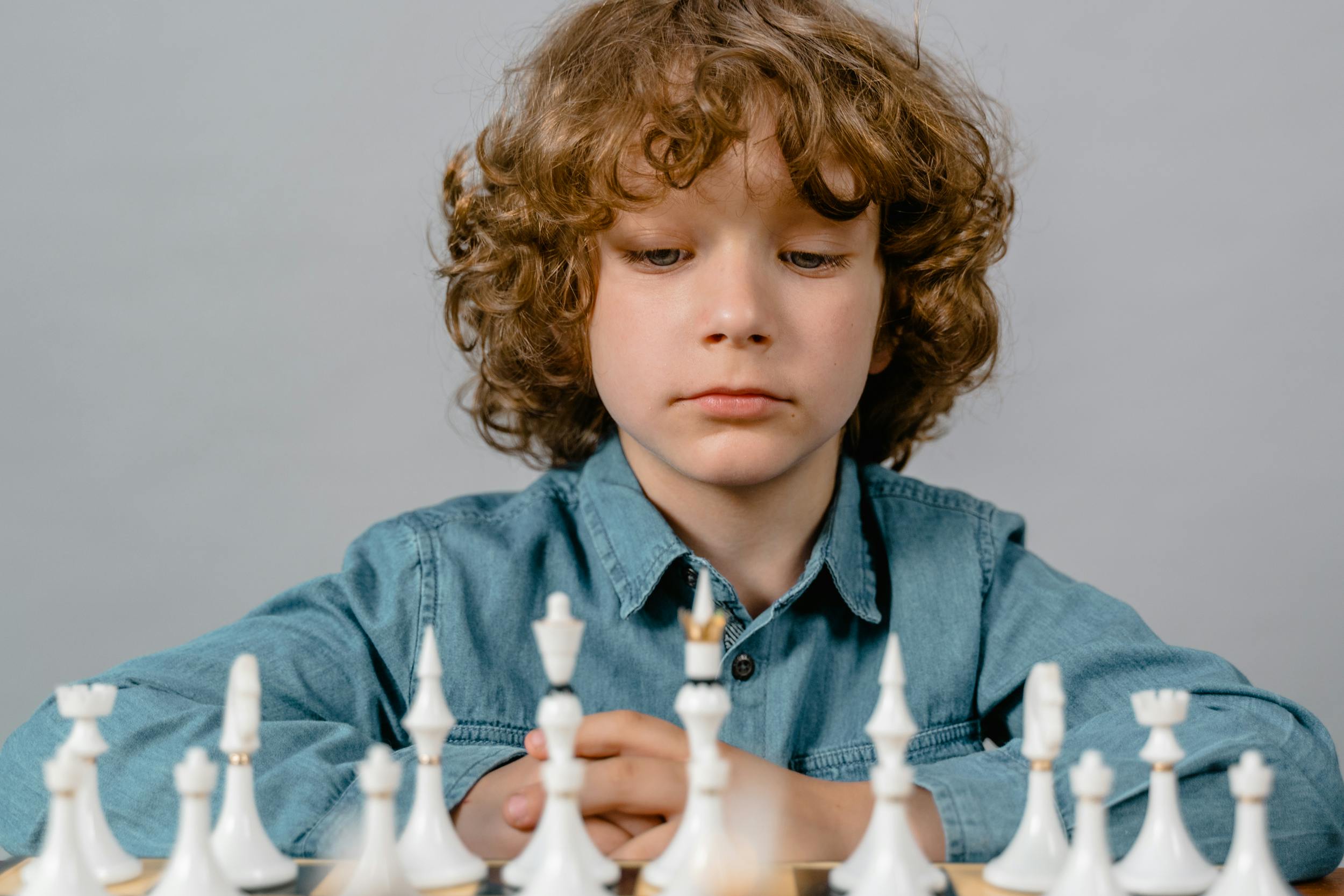 Boy Playing Chess